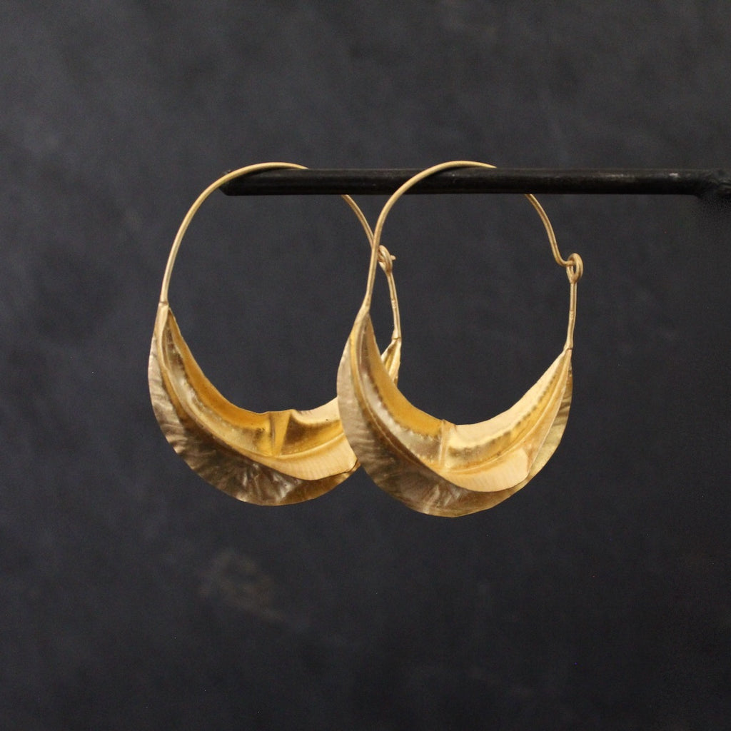 Large brushed gold twist hoop earrings - Beyond Biasa 
